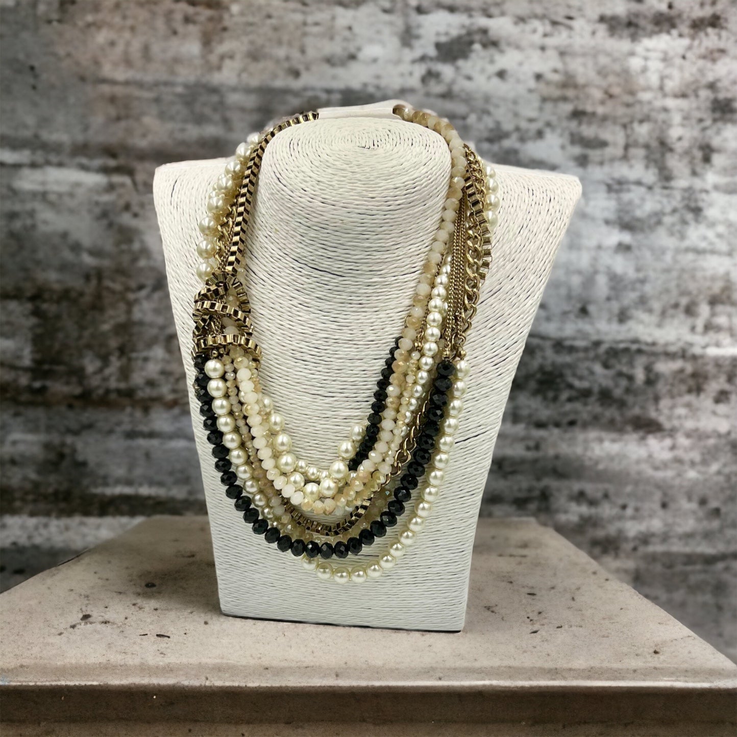 Elegance in Ebony: Black & Gold Layered Necklace with Lustrous Pearls