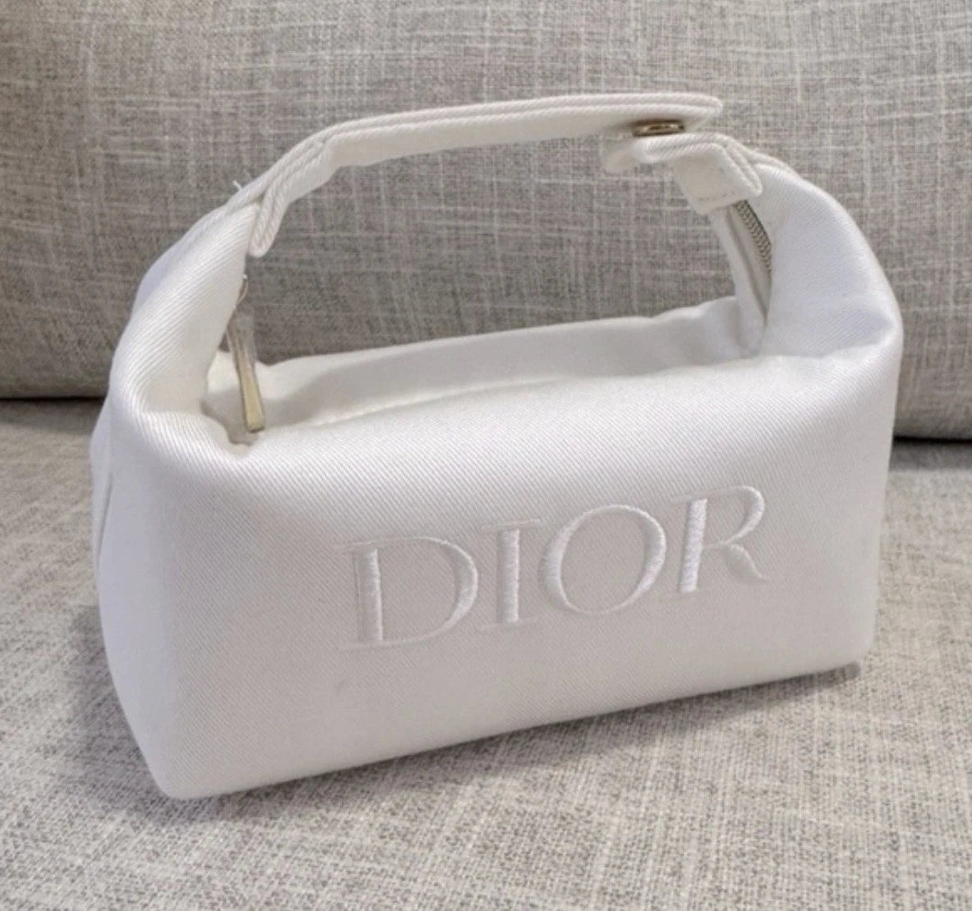 Dior Dumpling-Shaped Embossed Logo Makeup Bag