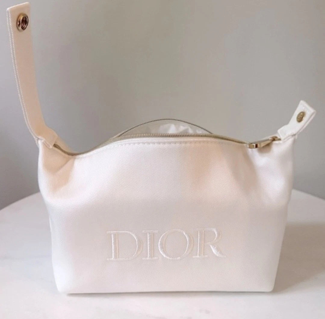 Dior Dumpling-Shaped Embossed Logo Makeup Bag